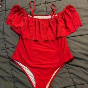 Red one-piece swimsuit. Can be worn 3 separate ways! Perfect for 4th of July!